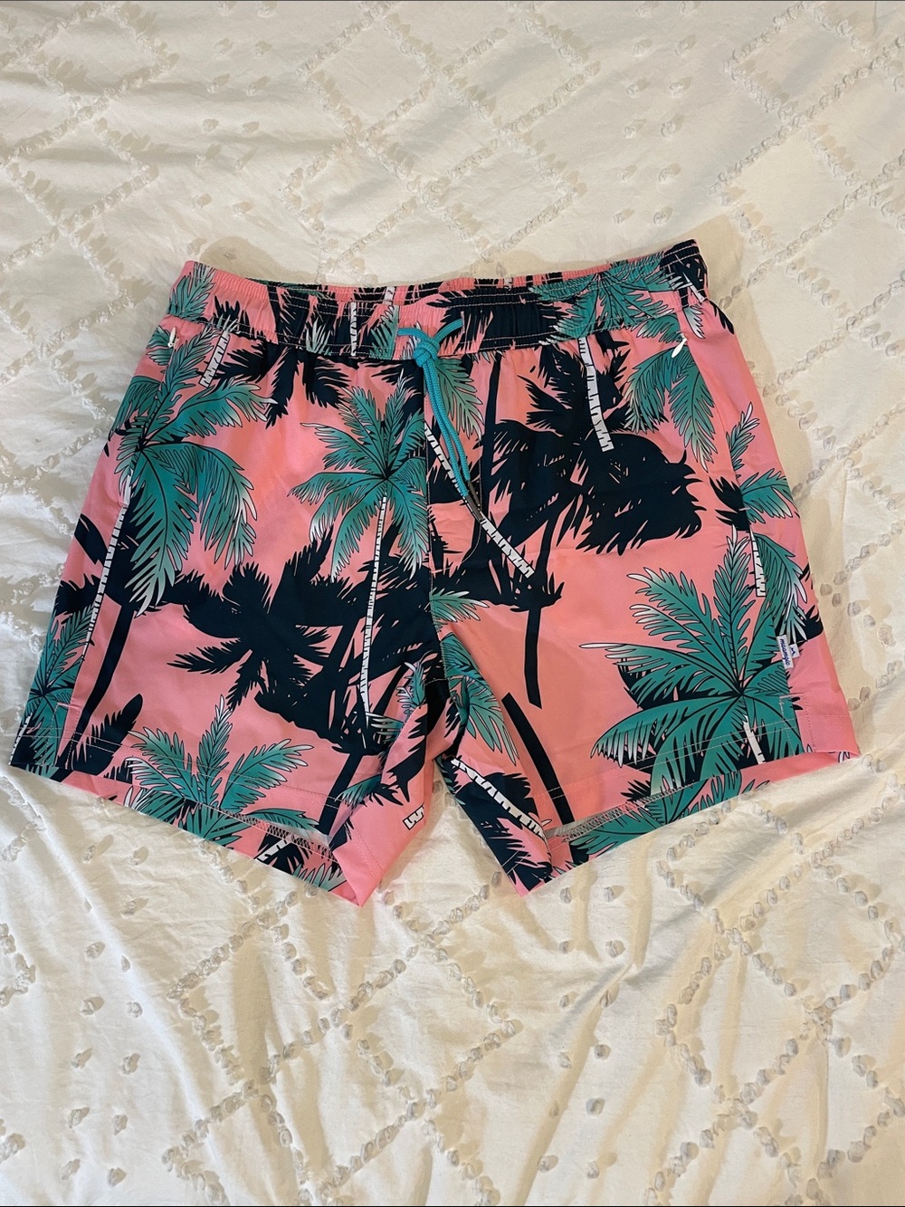 Men's Pink Tropical Palm Swim Trunks with Green Accents